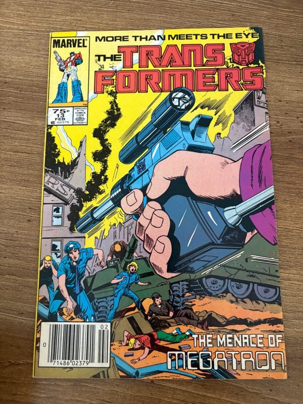 Transformers #13 (Marvel Comics), raw comic book in FN/VF condition — front cover