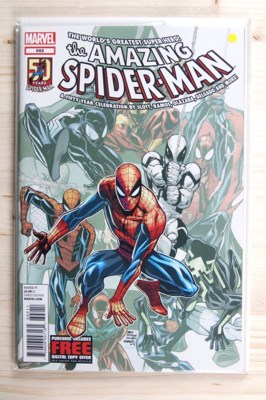 The Amazing Spider-Man #692 (Marvel Comics, 2012), raw comic book in NM 9.4 condition — front cover