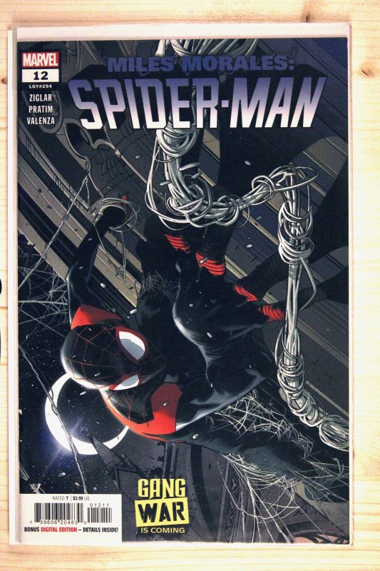 Miles Morales: Spider-Man #12 (Marvel Comics, 2023), raw comic book in NM+ 9.6 condition — front cover