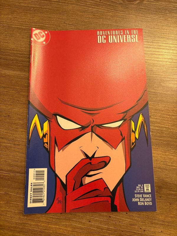 Adventures in the DC Universe #9 (DC Comics), raw comic book in VF/NM condition — front cover