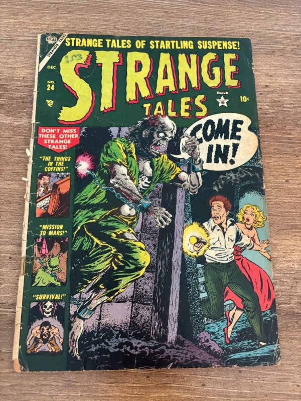 Strange Tales #24 (Marvel Comics, 1953), raw comic book in GD/VG condition — front cover