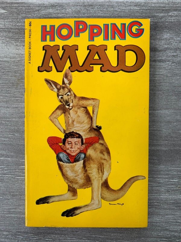 1969 Hopping MAD William M Gaines FN 6.0 1st Signet P4034 Paperback (1969), raw comic book in FN 6.0 condition — front cover