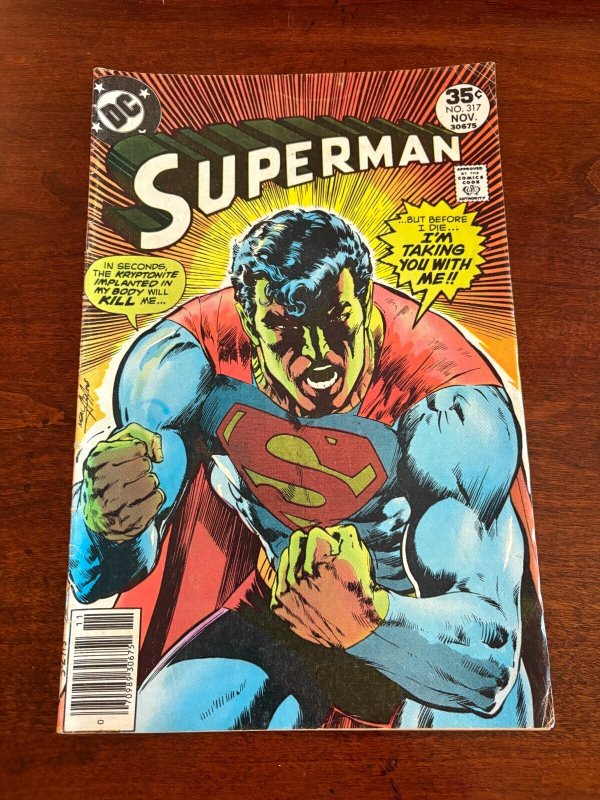 Superman #317 (DC Comics), raw comic book in FN condition — front cover