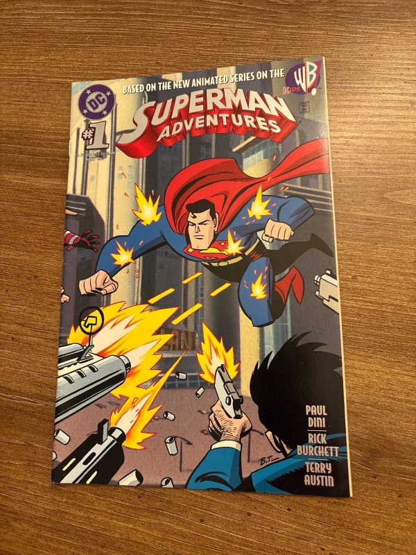 Superman Adventures #1 (DC Comics), raw comic book in NM condition — front cover