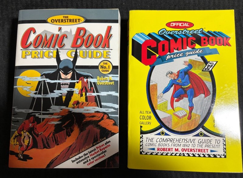 2001/2002 Overstreet Comic Book Price Guide #31 & #32 Fn+/fvf Batman & Superman, raw comic book in FN+ condition — front cover