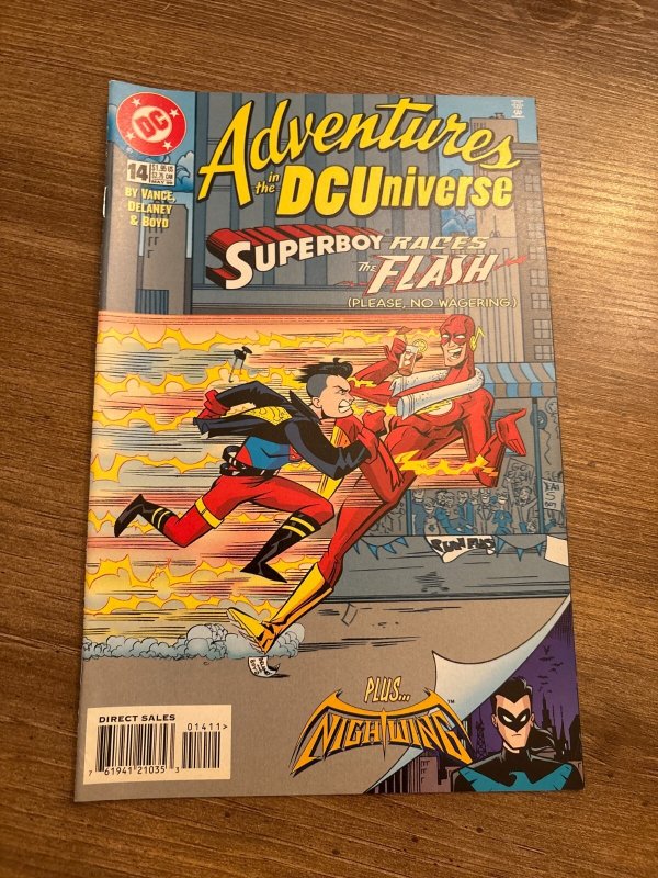 Adventures in the DC Universe #14 (DC Comics), raw comic book in NM condition — front cover
