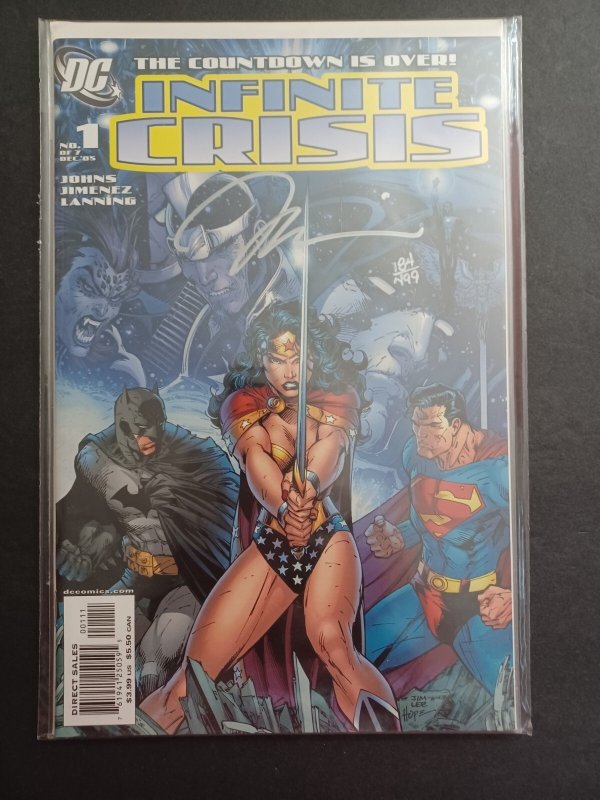 Infinite Crisis #1, raw comic book in NM condition — front cover