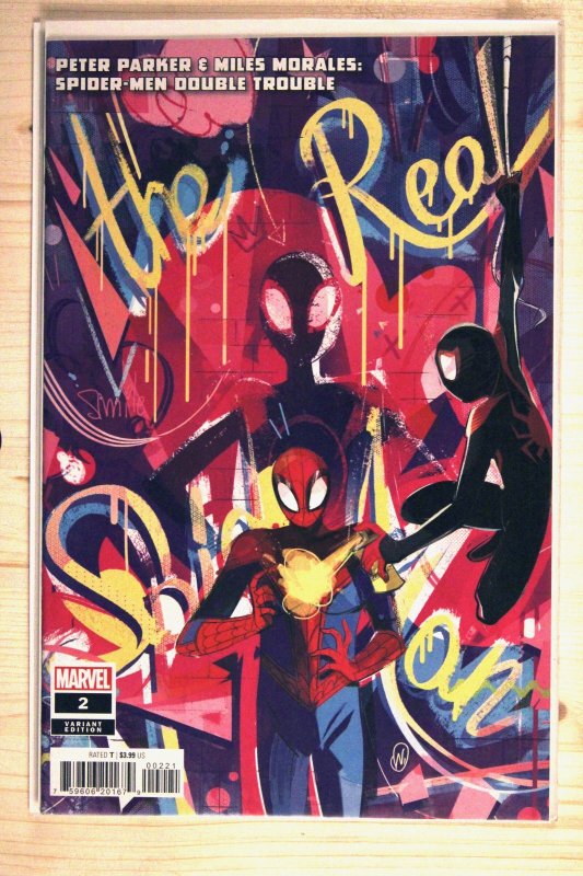 Peter Parker and Miles Morales Spider-Men Double Trouble #2 (Marvel Comics, 2023), raw comic book in 9.6 condition — front cover