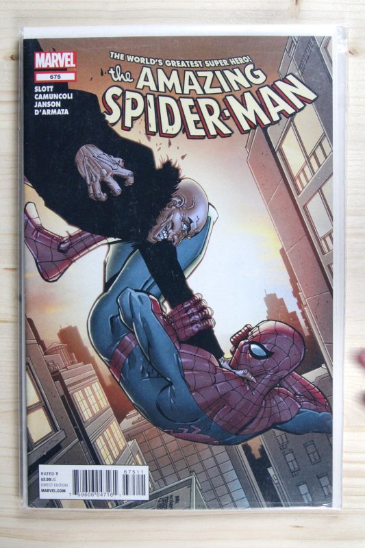 The Amazing Spider-Man #675 (Marvel Comics, 2012), raw comic book in NM 9.4 condition — front cover