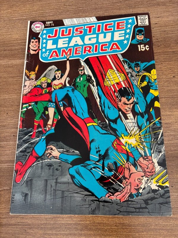 Justice League of America #74 (DC Comics), raw comic book in FN condition — front cover