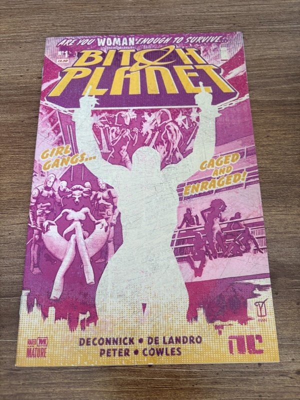 Bitch Planet #1 (2014), raw comic book in NM condition — front cover