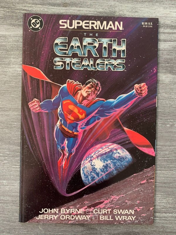 1988 Superman the Earth Stealers SC VF 8.0 1st DC Comics John Byrne (DC Comics, 1988), raw comic book in VF 8.0 condition — front cover