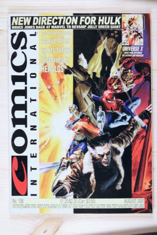 Comics International #136 (2001), raw comic book in VF 8.0 condition — front cover
