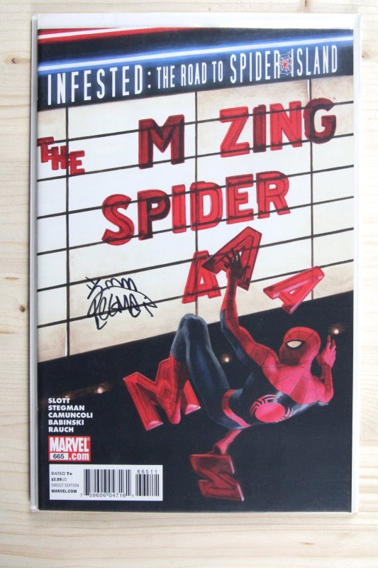 The Amazing Spider-Man #665 (Marvel Comics, 2011), raw comic book in NM 9.4 condition — front cover
