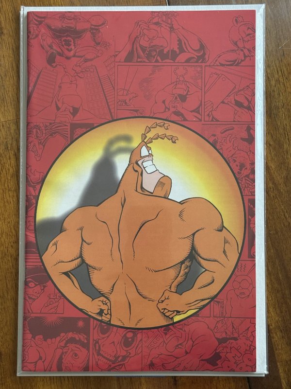 The Tick's Back #0 (1997), raw comic book in NM- 9.2 condition — front cover