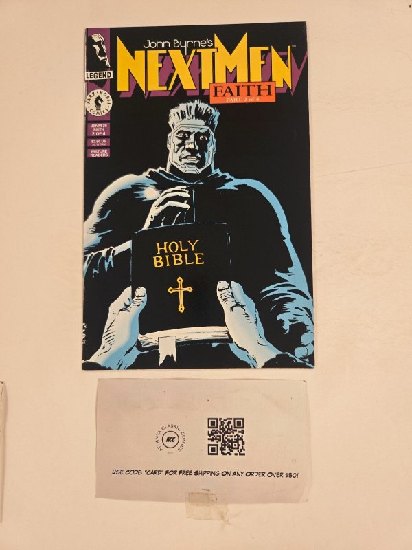 John Byrne's Next Men Faith #2 (Dark Horse Comics), raw comic book in NM condition — front cover