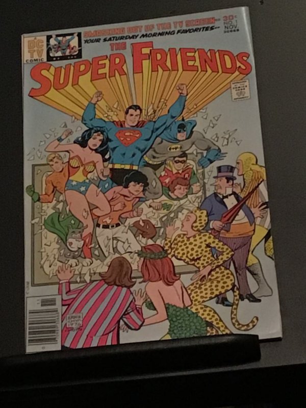 Super Friends #1 (1976), comic book — front cover in its holder