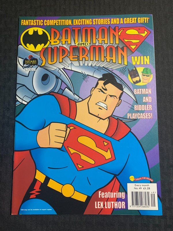 1999 Batman AND Superman Magazine #49 (1999), raw comic book in 7.0 condition — front cover