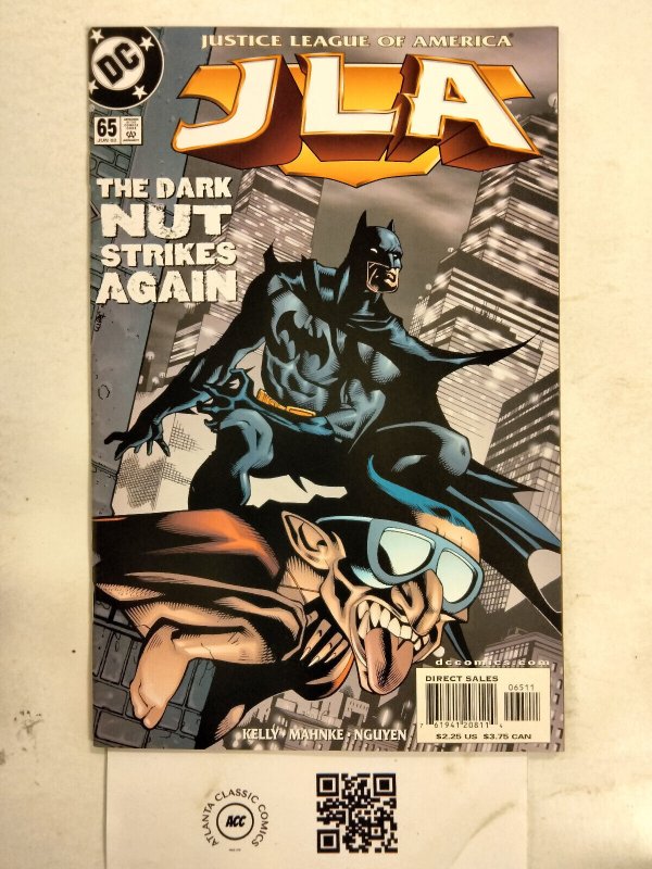 JLA #65 (DC Comics), raw comic book in NM condition — front cover
