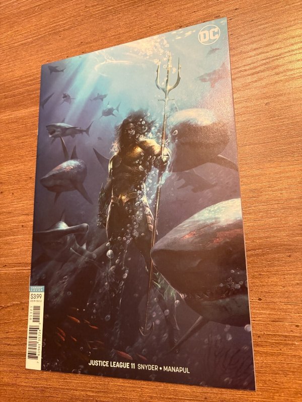 Justice League #11 (DC Comics), raw comic book in NM condition — front cover
