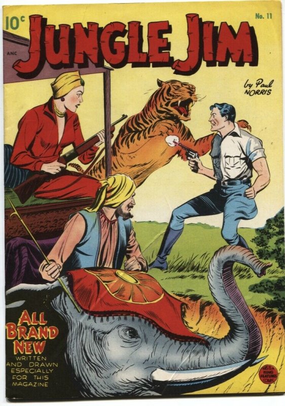 Jungle Jim #11-1949-First Issue-Tiger & Elephant Cover-Paul Norris Art-Standard, raw, ungraded comic book — front cover