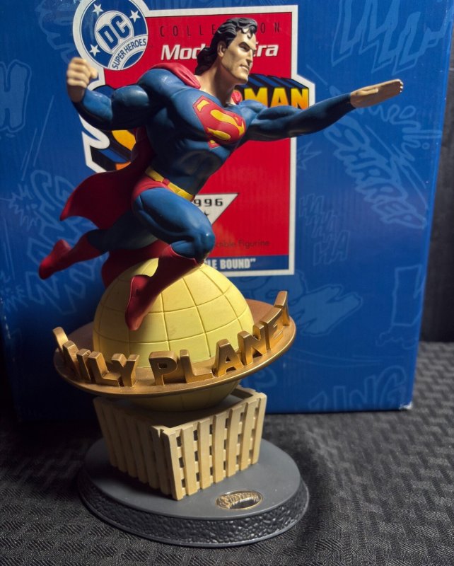 1996 Modern ERA Superman in a Single Bound MIB C-6.5 Hallmark Figurine (1996), raw comic book in 6.5 condition — front cover
