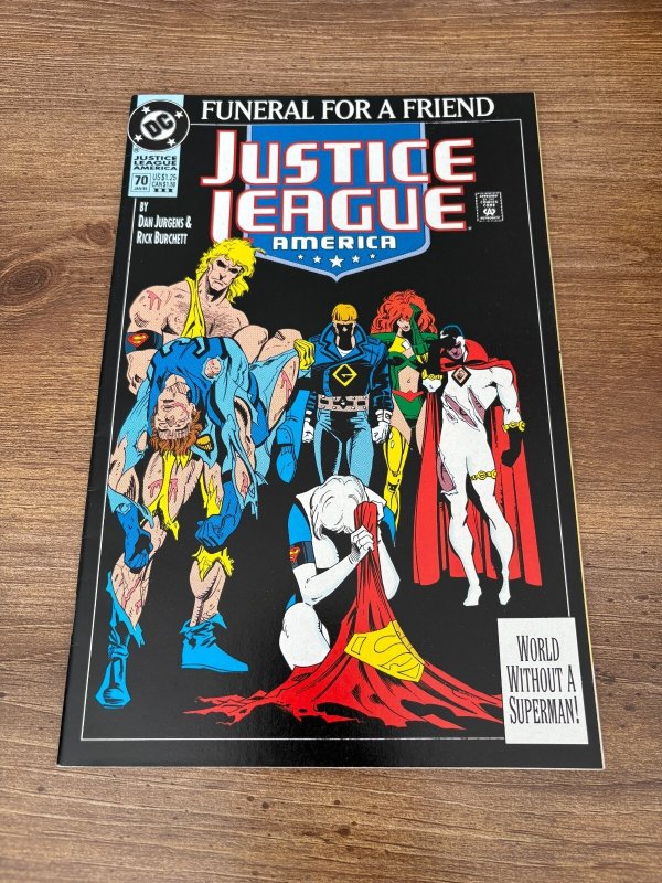 Justice League #70 (DC Comics), raw comic book in NM condition — front cover