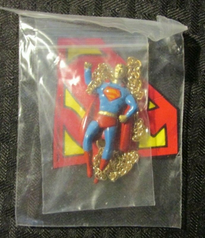 1978 Superman 2.25" Figural Charm & 17" Chain Necklace VF 8.0 (1978), raw comic book in VF 8.0 condition — front cover