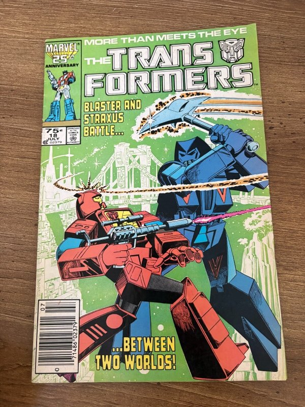 Transformers #18 (Marvel Comics), raw comic book in FN condition — front cover