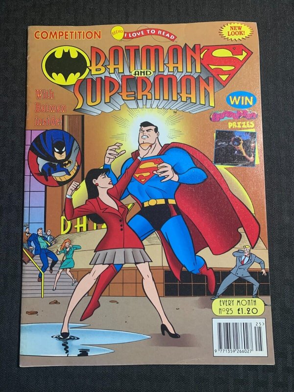 1997 Batman AND Superman Magazine #23 (1997), raw comic book in FN+ 6.5 condition — front cover