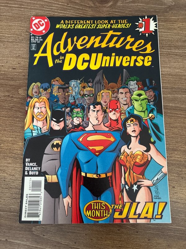 Adventures in the DC Universe #1, raw comic book in NM condition — front cover