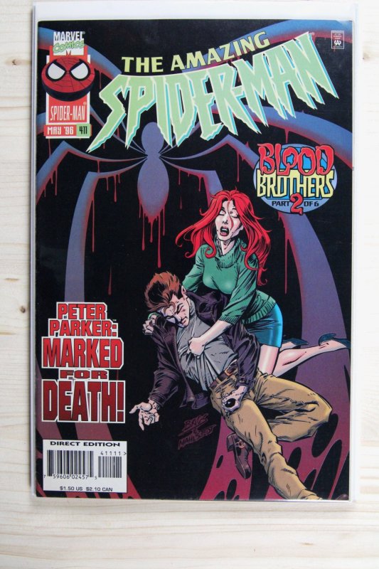 The Amazing Spider-Man #411 (Marvel Comics, 1996), raw comic book in NM 9.4 condition — front cover