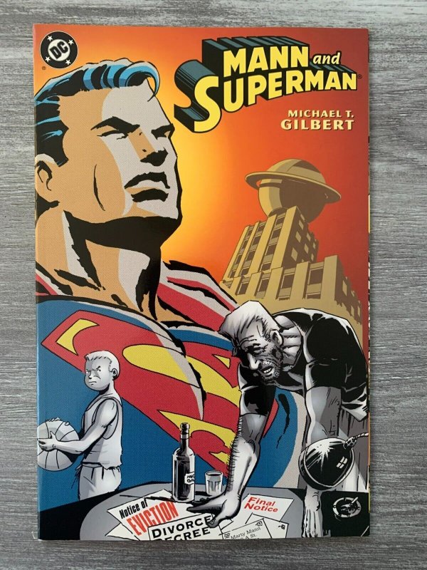 2000 Mann AND Superman by Micheal T Gilbert SC VF- 7.5 DC Comics (DC Comics, 2000), raw comic book in VF- 7.5 condition — front cover