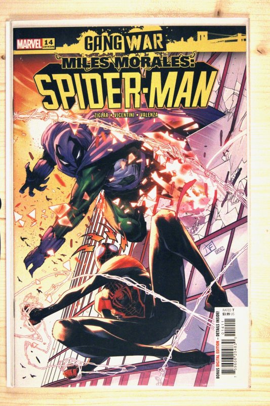 Miles Morales: Spider-Man #14 (Marvel Comics, 2023), raw comic book in NM+ 9.6 condition — front cover