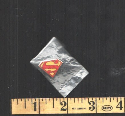 Superman Pin Back Button Sealed in Original Bag-1944-Size is About ¾"x ¾"&, raw, ungraded comic book — front cover