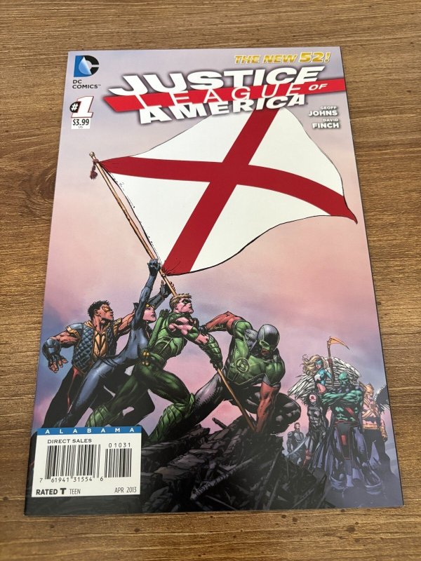 Justice League of America #1 (DC Comics, 2006), raw comic book in NM condition — front cover