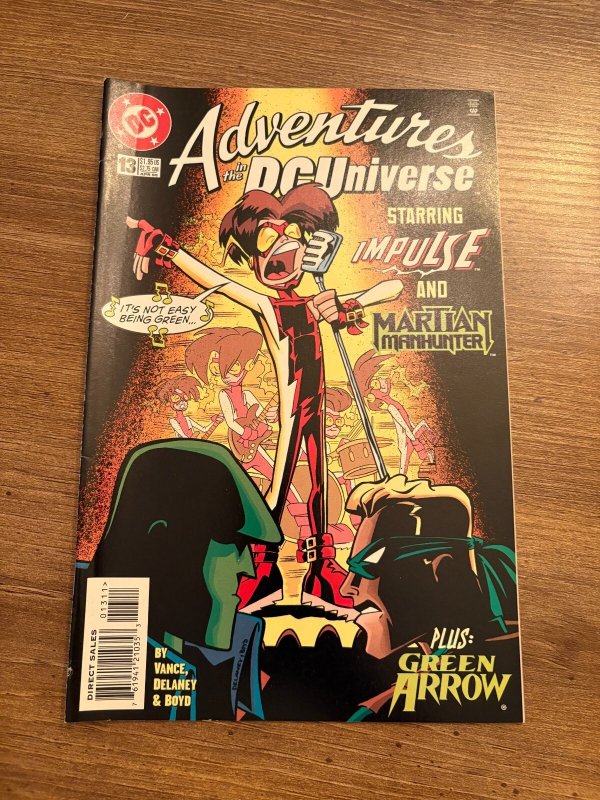 Adventures in the DC Universe #13 (DC Comics), raw comic book in VF/NM condition — front cover