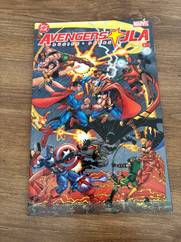 JLA Avengers #2 (DC Comics), raw comic book in NM condition — front cover