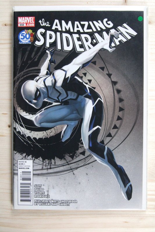 The Amazing Spider-Man #658 (Marvel Comics, 2011), raw comic book in NM 9.4 condition — front cover