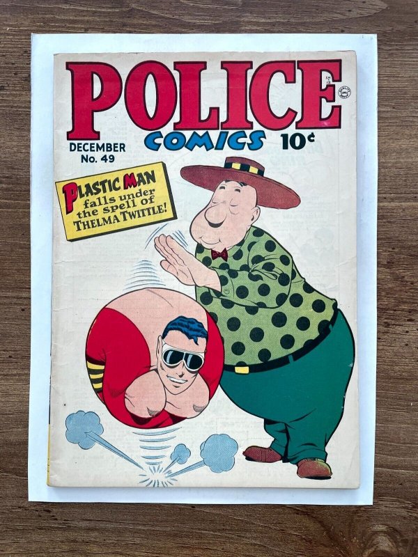 Police Comics #49 (1945), raw comic book in NM condition — front cover