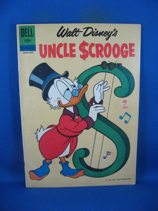 Uncle Scrooge #38 (1962), raw comic book in VG condition — front cover