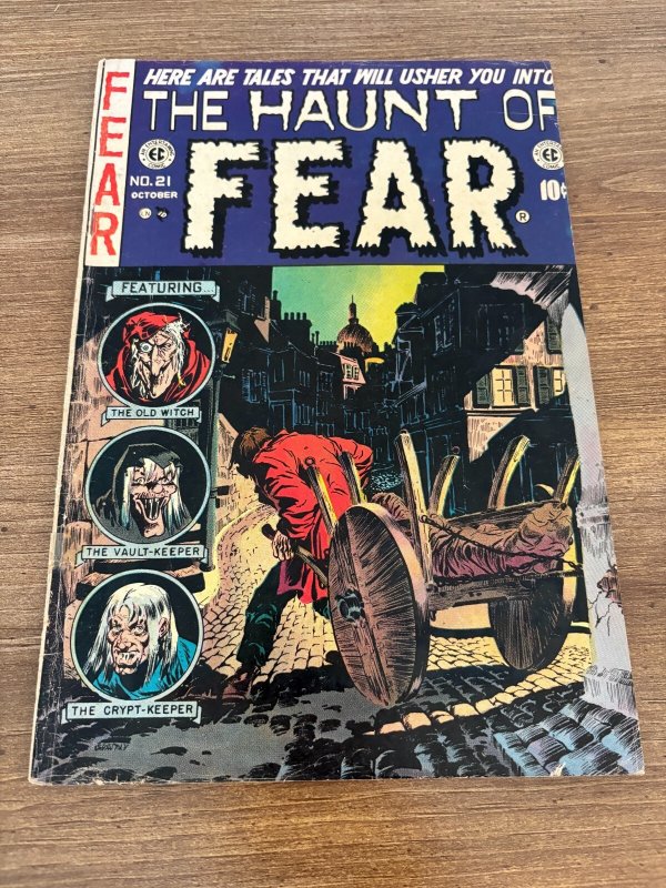 The Haunt of Fear #21 (EC Comics), raw comic book in VG condition — front cover