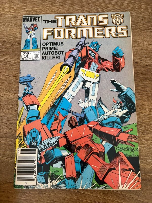 Transformers #12 (Marvel Comics), raw comic book in FN/VF condition — front cover