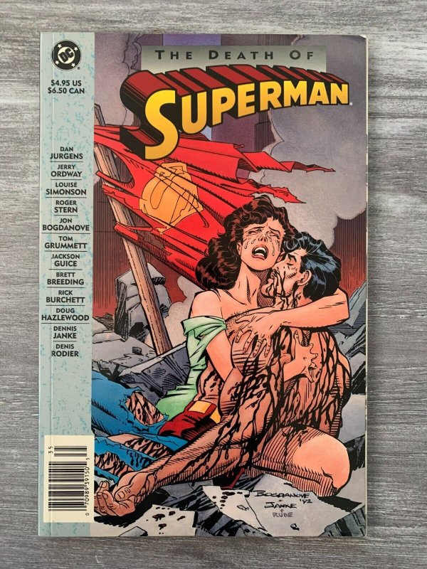 1993 THE Death OF Superman TPB SC FN+ 6.5 1st DC Comics / Dan Jurgens (DC Comics, 1993), raw comic book in FN+ 6.5 condition — front cover