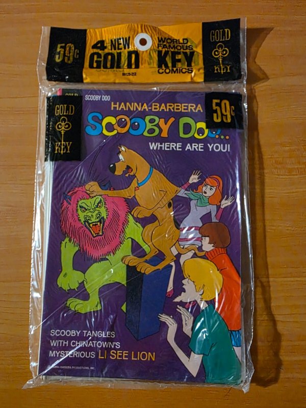 Gold Key 4 Pack Sealed Scooby-Doo #16 Daffy Duck #80 Cracky #2 Yosemite NM 1972 (Gold Key, 1972), raw comic book in NM condition — front cover