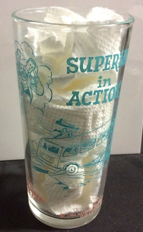 1964 "Superman in Action" 5 3/4" Tall Glass "Bus" Polanar Aqua/pink Mint (1964), raw, ungraded comic book — front cover