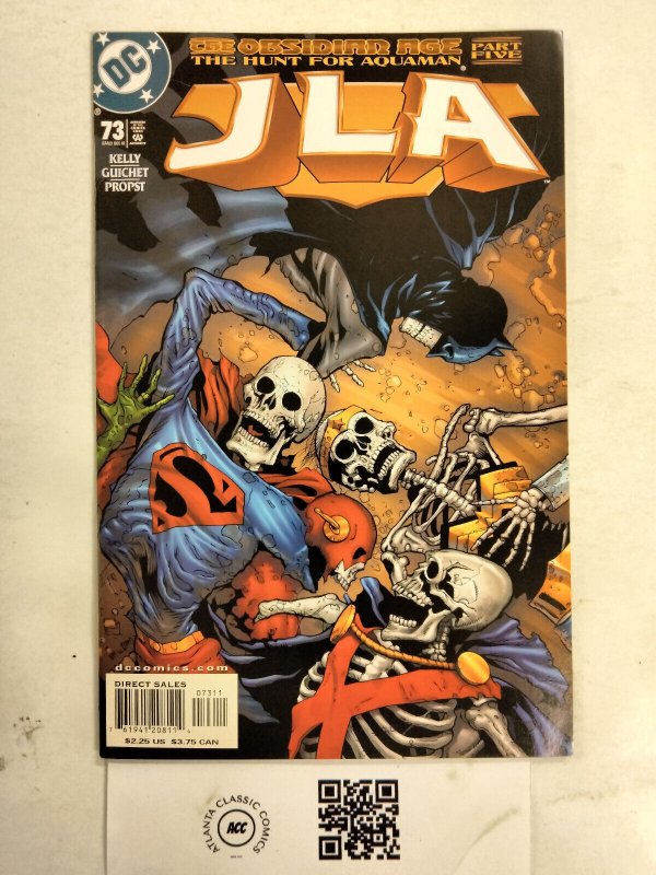 JLA #73 (DC Comics, 2002), raw comic book in NM condition — front cover