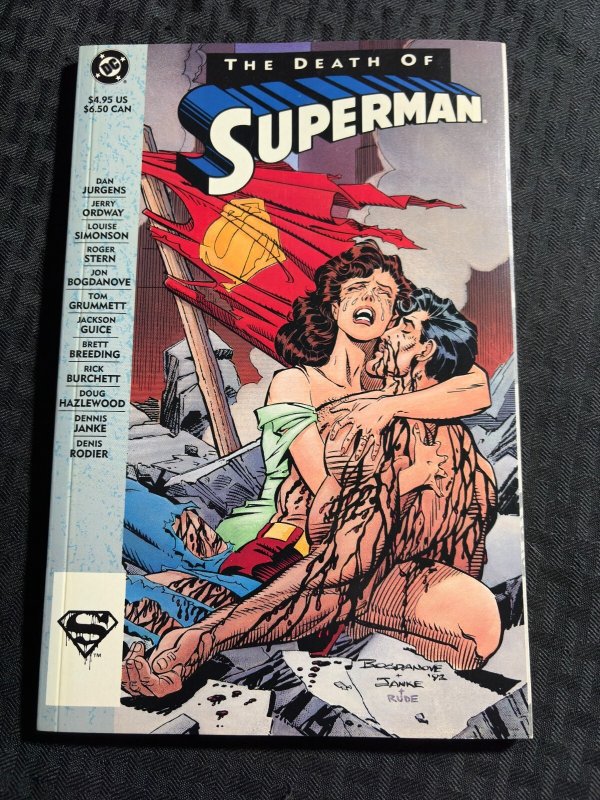1993 THE Death OF Superman SC TPB VF 8.0 2nd DC Comics / Dan Jurgens (DC Comics, 1993), raw comic book in VF 8.0 condition — front cover