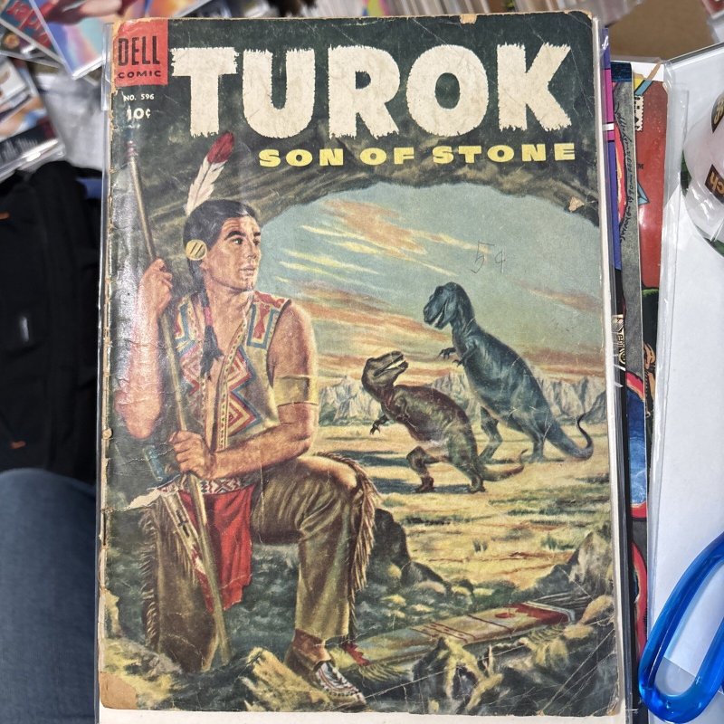 Four Color #596 (Dell Comics, 1954), raw comic book in 2.0 condition — front cover