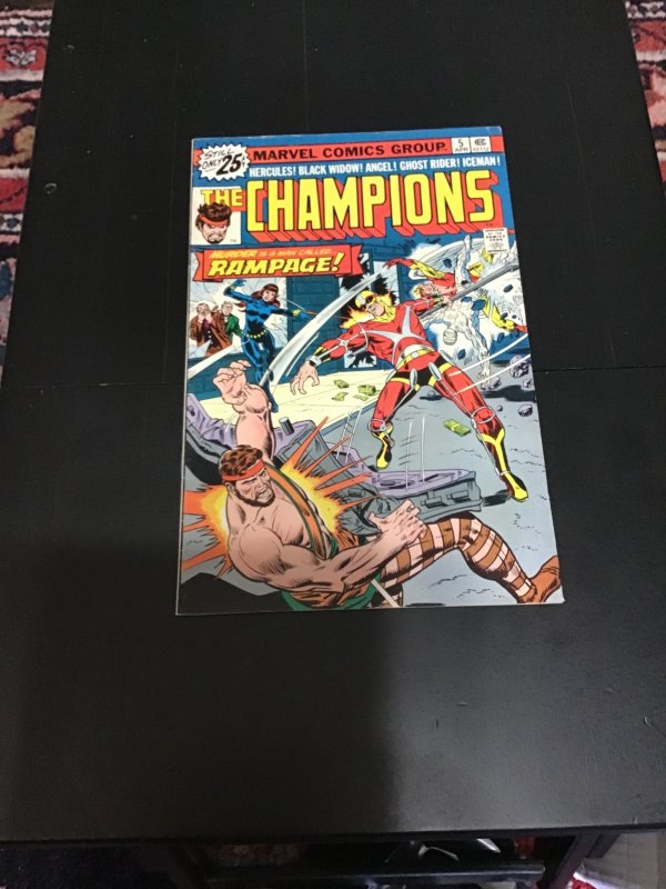 The Champions #5 (1976), comic book — front cover in its holder